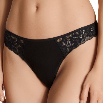 Läs mer om Calida Trosor Natural Comfort Lace Thong Svart bomull X-Small Dam