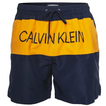 Läs mer om Calvin Klein Badbyxor Core Placed Logo Medium Drawstring Orange/Mörkblå polyester Medium Herr