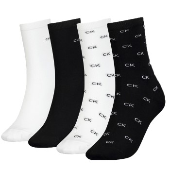 Läs mer om Calvin Klein Strumpor 4P Holiday Pack Aop Socks Svart/Vit One Size Dam